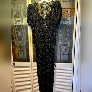 Black beaded evening gown.